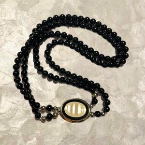 Black Beaded Necklace with Gold Accents
